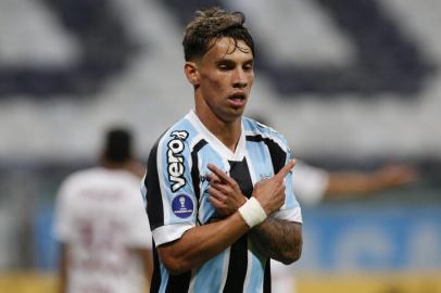 Brazils Gremio Ferreira celebrates after scoring against Argentinas Lanus during the Copa Sudamericana football tournament group stage match at Gremio Arena in Porto Alegre, Brazil, on May 13, 2021. (Photo by SILVIO AVILA / various sources / AFP)Editoria: SPOLocal: Porto AlegreIndexador: SILVIO AVILASecao: soccerFonte: AFPFotógrafo: STR<!-- NICAID(14782991) -->