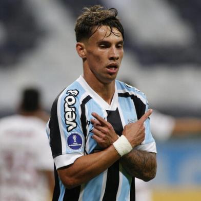 Brazils Gremio Ferreira celebrates after scoring against Argentinas Lanus during the Copa Sudamericana football tournament group stage match at Gremio Arena in Porto Alegre, Brazil, on May 13, 2021. (Photo by SILVIO AVILA / various sources / AFP)Editoria: SPOLocal: Porto AlegreIndexador: SILVIO AVILASecao: soccerFonte: AFPFotógrafo: STR<!-- NICAID(14782991) -->