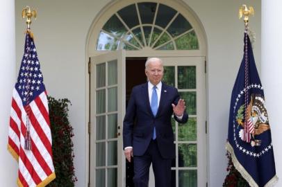 WASHINGTON, DC - MAY 13: U.S. President Joe Biden arrives in the Rose Garden to deliver remarks on the COVID-19 response and vaccination program at the White House on May 13, 2021 in Washington, DC. The Centers for Disease Control and Prevention (CDC) announced today that fully vaccinated people will no longer need to wear masks or socially distance for indoor and outdoor activities in most settings.   Alex Wong/Getty Images/AFP (Photo by ALEX WONG / GETTY IMAGES NORTH AMERICA / Getty Images via AFP)<!-- NICAID(14784923) -->