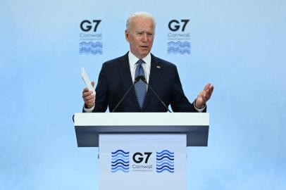 US President Joe Biden takes part in a press conference on the final day of the G7 summit at Cornwall Airport Newquay, near Newquay, Cornwall on June 13, 2021. (Photo by Brendan Smialowski / AFP)<!-- NICAID(14807751) -->