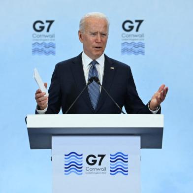 US President Joe Biden takes part in a press conference on the final day of the G7 summit at Cornwall Airport Newquay, near Newquay, Cornwall on June 13, 2021. (Photo by Brendan Smialowski / AFP)<!-- NICAID(14807751) -->