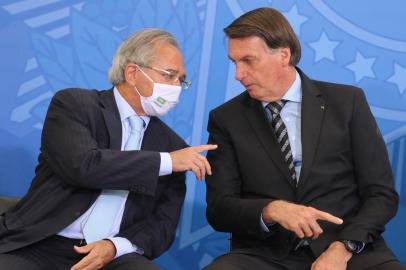 O ministro da Economia, Paulo Guedes e o  presidente da RepÃºblica, Jair Bolsonaro, durante o lanÃ§amento dos programas CODEX e SUPER.BR e do 8Âº RevogaÃ§o no PalÃ¡cio do Planalto.O ministro da Economia, Paulo Guedes e o  presidente da RepÃºblica, Jair Bolsonaro, durante o lanÃ§amento dos programas CODEX e SUPER.BR e do 8Âº RevogaÃ§o no PalÃ¡cio do Planalto.Foto: Fábio Rodrigues Pozzebom/Agência BrasilLocal: BrasÃ­liaIndexador: FÃ¡bio Rodrigues Pozzebom/AgÃªncFonte: AgÃªncia Brasil/Empresa Brasil dFotógrafo: Reporter Fotografico<!-- NICAID(14808858) -->