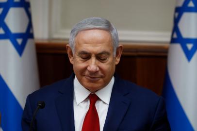 Israeli Prime Minister Benjamin Netanyahu attends the weekly cabinet meeting at the Prime Ministers office in Jerusalem on December 23, 2018. (Photo by RONEN ZVULUN / POOL / AFP) / ¿The erroneous mention[s] appearing in the metadata of this photo by RONEN ZVULUN has been modified in AFP systems in the following manner, source : [POOL] instead of [AFP]. Please immediately remove the erroneous mention[s] from all your online services and delete it (them) from your servers. If you have been authorized by AFP to distribute it (them) to third parties, please ensure that the same actions are carried out by them. Failure to promptly comply with these instructions will entail liability on your part for any continued or post notification usage. Therefore we thank you very much for all your attention and prompt action. We are sorry for the inconvenience this notification may cause and remain at your disposal for any further information you may require.¿