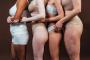 Group of multiethnic women with different kind of skin posing together in studio. Concept about body positivity and self acceptanceIndexador: margarita gangaloFonte: 415817220<!-- NICAID(14824440) -->