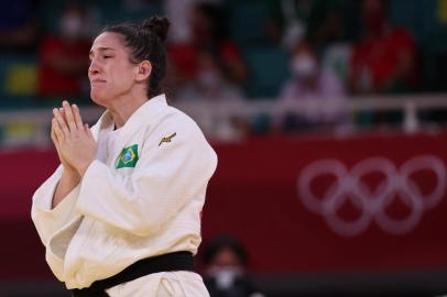 Brazils Mayra Aguiar reacts after defeating South Koreas Hyunji Yoon in the judo womens -78kg bronze medal B bout during the Tokyo 2020 Olympic Games at the Nippon Budokan in Tokyo on July 29, 2021. (Photo by Jack GUEZ / AFP)<!-- NICAID(14847725) -->