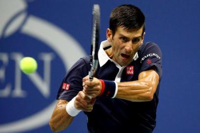 2015 U.S. Open - Day 9NEW YORK, NY - SEPTEMBER 08: Novak Djokovic of Serbia returns a shot to Feliciano Lopez of Spain during their Mens Singles Quarterfinals match on Day Nine of the 2015 US Open at the USTA Billie Jean King National Tennis Center on September 8, 2015 in the Flushing neighborhood of the Queens borough of New York City.   Clive Brunskill/Getty Images/AFPEditoria: SPOLocal: New YorkIndexador: CLIVE BRUNSKILLSecao: TennisFonte: GETTY IMAGES NORTH AMERICAFotógrafo: STF