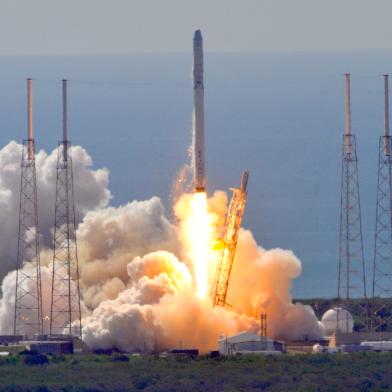 Space Xs Falcon 9 rocket as it lifts off from space launch complex 40 at Cape Canaveral, Florida June 28, 2015 with a Dragon CRS7 spacecraft.  The unmanned SpaceX Falcon 9 rocket exploded minutes after liftoff from Cape Canaveral, Florida, following what was meant to be a routine cargo mission to the International Space Station. The vehicle has broken up, said NASA commentator George Diller, after NASA television broadcast images of the white rocket falling to pieces. At this point it is not clear to the launch team exactly what happened. The disaster was the first of its kind for the California-based company headed by Internet entrepreneur Elon Musk, who has led a series of successful launches even as competitor Orbital Sciences lost one of its rockets in an explosion in October, and a Russian supply ships was lost in April. SpaceXs live webcast of the launch went silent about two minutes 19 seconds into the flight, and soon after the rocket could be seen exploding and small pieces tumbling back toward Earth.     AFP PHOTO/ BRUCE WEAVER