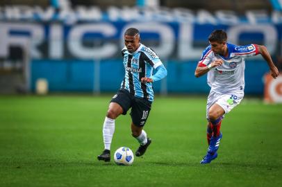 Gremio x BahiaRS - FUTEBOL/CAMPEONATO BRASILEIRO 2021 /GREMIO X BAHIA- ESPORTES - Lance da partida entre Gremio e Bahia disputada na noite deste sabado, na Arena do Gremio, em partida valida pela Campeonato Brasileiro 2021. FOTO: LUCAS UEBEL/GREMIO FBPA, douglas costaEditoria: SPOLocal: Porto AlegreIndexador: Lucas UebelSecao: futebolFonte: Gremio.netFotógrafo: Gremio x Bahia<!-- NICAID(14868961) -->