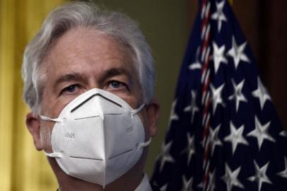 (FILES) In this file photo Director of the Central Intelligence Agency William Burns looks on after being sworn in by US Vice President Kamala Harris on March 23, 2021 at the Eisenhower Executive Office Building Ceremonial Office in Washington, DC. - US Central Intelligence Agency chief William Burns held a secret meeting in Kabul with Taliban co-founder Mullah Abdul Ghani Baradar, the Washington Post reported on August 24, 2021. The Monday meeting, which if confirmed will have been the highest-level encounter between the Islamist group and the Biden administration since the militants return to power, came as efforts to evacuate thousands of people from Taliban-controlled Afghanistan became increasingly urgent. (Photo by OLIVIER DOULIERY / AFP)<!-- NICAID(14870585) -->