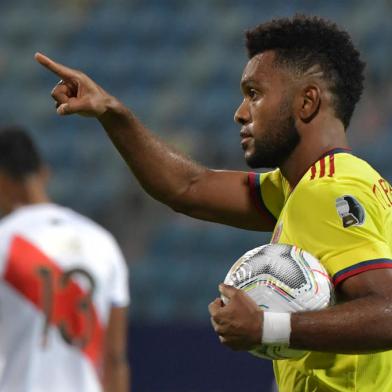 Colombias Miguel Angel Borja celebrates after scoring a penalty against Peru during their Conmebol Copa America 2021 football tournament group phase match at the Olympic Stadium in Goiania, Brazil, on June 20, 2021. (Photo by NELSON ALMEIDA / AFP)Editoria: SPOLocal: GoianiaIndexador: NELSON ALMEIDASecao: soccerFonte: AFPFotógrafo: STF<!-- NICAID(14851829) -->