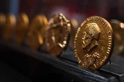 Nobel medals are displayed at the laboratory of Alfred Nobel, where powder trials and experiments with artificial rubber and synthetic threads were carried out, in Karlskoga, Sweden on September 16, 2021. - Alfred Nobels last laboratory still exists, a stones throw from a big explosives plant. In Sweden and around the world, the industrial legacy of the Nobel Prize founder is still making sparks fly. (Photo by Jonathan NACKSTRAND / AFP)<!-- NICAID(14905300) -->