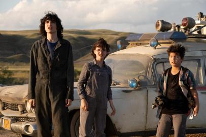 Trevor (Finn Wolfhard), Phoebe (Mckenna Grace) and Podcast (Logan Kim) in Columbia Pictures GHOSTBUSTERS: AFTERLIFE.<!-- NICAID(14942397) -->