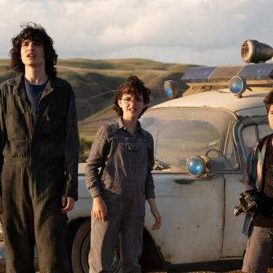 Trevor (Finn Wolfhard), Phoebe (Mckenna Grace) and Podcast (Logan Kim) in Columbia Pictures GHOSTBUSTERS: AFTERLIFE.<!-- NICAID(14942397) -->