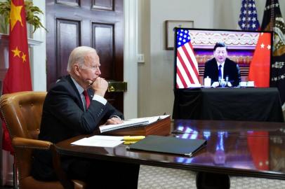 US President Joe Biden meets with Chinas President Xi Jinping during a virtual summit from the Roosevelt Room of the White House in Washington, DC, November 15, 2021. (Photo by MANDEL NGAN / AFP)<!-- NICAID(14948026) -->