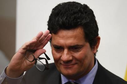 Brazilian Minister of Justice and Public Security, Sergio Moro, gestures after a press conference at Minister of Justice, in Brasilia, on April 24, 2020. - Brazilian Minister of Justice and Public Security, Sergio Moro, announce his resignation on Friday after Brazilian President Jair Bolsonaro dismissed the head of the Brazilian Federal Police. (Photo by EVARISTO SA / AFP)<!-- NICAID(14485272) -->