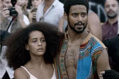 Taís Araujo e Alfred Enoch em Medida Provisória, primeiro longa ficcional dirigido por Lázaro Ramos<!-- NICAID(14960685) -->