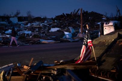 Tornado damage is seen after extreme weather hit the region December 11, 2021, in Mayfield, Kentucky. - Dozens of devastating tornadoes roared through five US states overnight, leaving more than 80 people dead Saturday in what President Joe Biden said was one of the largest storm outbreaks in history. (Photo by Brendan Smialowski / AFP)<!-- NICAID(14965936) -->