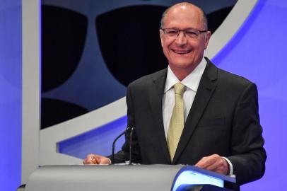 Brazilian presidential candidate for the Social Democratic Party of Brazil (PSDB) Geraldo Alckmin smiles during the presidential debate ahead of the October 7 general election, at SBT television network in Osasco, metropolitan area of Sao Paulo, Brazil, on September 26, 2018.Leftist candidate Fernando Haddad is gaining ground in Brazils presidential election campaign, with a poll showing Monday that he would beat right-wing frontrunner Jair Bolsonaro in a second round runoff. / AFP PHOTO / NELSON ALMEIDAEditoria: POLLocal: OsascoIndexador: NELSON ALMEIDASecao: electionFonte: AFPFotógrafo: STF<!-- NICAID(13758065) -->