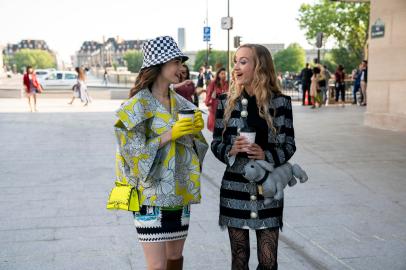 Emily in Paris. (L to R) Lily Collins as Emily, Daria Panchenko as Petra in episode 204 of Emily in Paris. Cr. Stéphanie Branchu / Netflix<!-- NICAID(14981623) -->