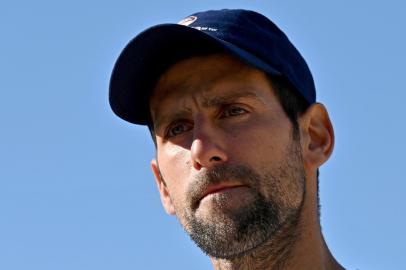 In this file photo taken on October 22, 2020, Serbian tennis player Novak Djokovic attends an open air press conference in Belgrade. Djokovic has pulled out of the ATP Cup in Sydney, organisers said on December 29, 2021, amid speculation about his vaccination status and whether he will defend his Australian Open title.Andrej ISAKOVIC / AFP