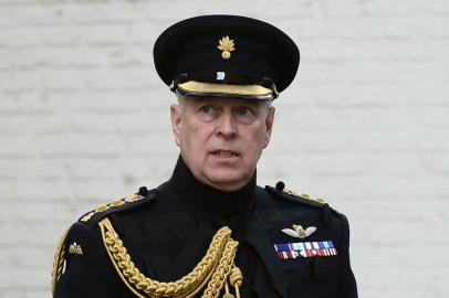 (FILES) In this file photo taken on September 7, 2019 Britains Prince Andrew, Duke of York, attends a ceremony commemorating the 75th anniversary of the liberation of Bruges. - Queen Elizabeth IIs second son Prince Andrew, who is facing a US civil case for sexual assault, has given up his honorary military and charitable roles, Buckingham Palace said on Thursday, January 13, 2022. (Photo by JOHN THYS / AFP)<!-- NICAID(14989202) -->