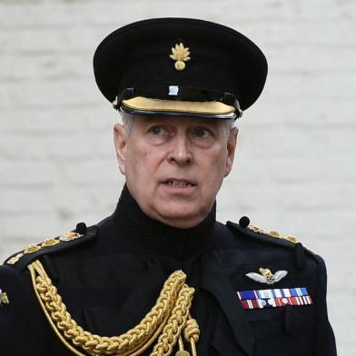 (FILES) In this file photo taken on September 7, 2019 Britains Prince Andrew, Duke of York, attends a ceremony commemorating the 75th anniversary of the liberation of Bruges. - Queen Elizabeth IIs second son Prince Andrew, who is facing a US civil case for sexual assault, has given up his honorary military and charitable roles, Buckingham Palace said on Thursday, January 13, 2022. (Photo by JOHN THYS / AFP)<!-- NICAID(14989202) -->