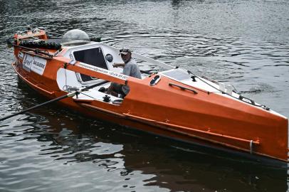 (FILES) In this file photo taken on May 28, 2021 Jean-Jacques Savin, a former paratrooper, 74, tests his rowboat at a shipyard in Lege-Cap-Ferret, southwestern France. - Jean-Jacques Savin, 75, who crossed the Atlantic Ocean in a barrel in 2019 before setting off again on January 1, 2022 to row across it, set off his distress beacons on January 21, 2022 and his team has no further contact since then, they say on January 22, 2022. (Photo by Philippe Lopez / AFP)<!-- NICAID(14996564) -->