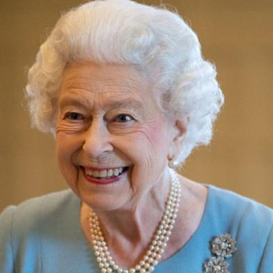 Britains Queen Elizabeth II smiles during a reception in the Ballroom of Sandringham House, the Queens Norfolk residence on February 5, 2022, as she celebrates the start of the Platinum Jubilee. - Queen Elizabeth II on Sunday will became the first British monarch to reign for seven decades, in a bittersweet landmark as she also marked the 70th anniversary of her fathers death. (Photo by Joe Giddens / POOL / AFP)<!-- NICAID(15008414) -->