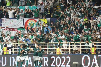 Fans cheer after Palmeiras midfielder Raphael Veiga (3rd-L) scored the opening goal during the 2021 FIFA Club World Cup semi-final football match between Egypts Al-Ahly and Brazils Palmeiras at al-Nahyan Stadium in Abu Dhabi, on February 8, 2022. (Photo by Karim SAHIB / AFP)<!-- NICAID(15010611) -->