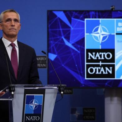 NATO Secretary General Jens Stoltenberg addresses a press conference at NATO Headquarters in Brussels on March 23, 2022. (Photo by Thomas COEX / AFP)<!-- NICAID(15049537) -->