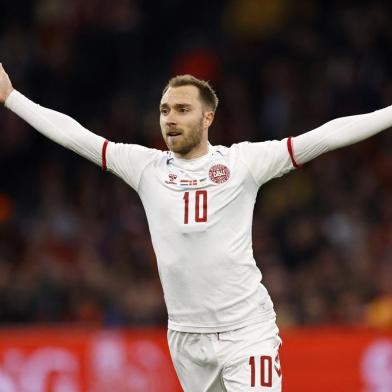 Denmarks Christian Eriksen celebrates after scoring a goal during the friendly football match between the Netherlands and Denmark at the Johan-Cruijff ArenA on March 26, 2022 in Amsterdam. (Photo by MAURICE VAN STEEN / ANP / AFP) / Netherlands OUTEditoria: SPOLocal: AmsterdamIndexador: MAURICE VAN STEENSecao: soccerFonte: ANPFotógrafo: STR<!-- NICAID(15052287) -->