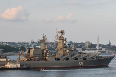 (FILES) This file photo taken on July 31, 2011 shows the Moskva guided missile cruiser participating in a Russian military Navy Day parade near a navy base in Sevastopol. - The Moskva, a Russian warship in the Black Sea, was seriously damaged by an ammunition explosion, Russian state media said on April 14, 2022. (Photo by AFP)<!-- NICAID(15071532) -->