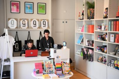 Members of staff work in the gift shop of the Queer Britain museum, in London, on May 6, 2022. - The Queer Britain museum opened in London May 5, 2022 and is the first British national LGBTQ+ musuem. (Photo by Daniel LEAL / AFP)<!-- NICAID(15089985) -->