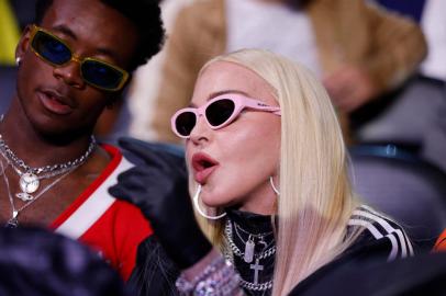 Gervonta Davis v Rolando RomeroBROOKLYN, NEW YORK - MAY 28: Entertainer Madonna looks on during the Gervonta Davis vs Rolando Romero fight for Davis WBA World lightweight title at Barclays Center on May 28, 2022 in Brooklyn, New York.   Al Bello/Getty Images/AFP (Photo by AL BELLO / GETTY IMAGES NORTH AMERICA / Getty Images via AFP)Editoria: SPOLocal: BrooklynIndexador: AL BELLOSecao: boxingFonte: GETTY IMAGES NORTH AMERICA<!-- NICAID(15110798) -->