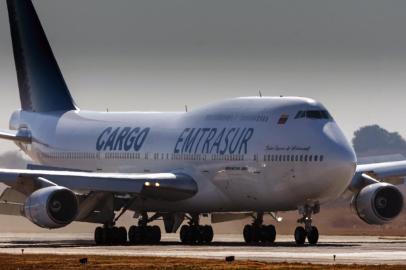 View of the Boeing 747-300 registrered number YV3531 of Venezuelan Emtrasur cargo airline at the international airport in Cordoba, Argentina, on June 6, 2022, before taking off for Buenos Aires. - A plane transporting automotive components, 14 Venezuelan crew members and five Iranians, is being held at the Ezeiza airport in Buenos Aires, after raising suspicion on the motifs of its flight to Argentina, official sources informed AFP on June 12, 2022. (Photo by Sebastian BORSERO / AFP)<!-- NICAID(15127411) -->