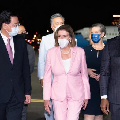 This handout picture taken and released by Taiwans Ministry of Foreign Affairs (MOFA) on August 2, 2022 shows Speaker of the US House of Representatives Nancy Pelosi being welcomed upon her arrival at Sungshan Airport in Taipei. (Photo by Handout / Taiwans Ministry of Foreign Affairs (MOFA) / AFP) / -----EDITORS NOTE --- RESTRICTED TO EDITORIAL USE - MANDATORY CREDIT AFP PHOTO / Ministry of Foreign Affairs - NO MARKETING - NO ADVERTISING CAMPAIGNS - DISTRIBUTED AS A SERVICE TO CLIENTS<!-- NICAID(15164731) -->