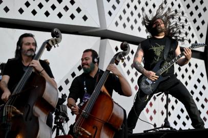 Sepulturas Brazilian guitarist Andreas Kisser performs during the concert with the Brazilian Simphony Orchestra at the Main Stage of the Rock in Rio music festival at the Olympic Park in Rio de Janeiro, Brazil, on September 2, 2022. - The Rock in Rio megafestival shakes up the city of Rio de Janeiro again starting this Friday after a three-year break due to the Coronavirus pandemic, with names like Justin Bieber, Dua Lipa and Coldplay among its principal attractions. (Photo by MAURO PIMENTEL / AFP)<!-- NICAID(15195950) -->