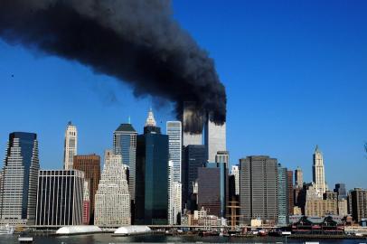 US-WORLD TRADE-DOWNTOWNThe twin towers of the World Trade Center billow smoke after hijacked airliners crashed into them early 11 September, 2001. The suspected terrorist attack has caused the collapsed of both towers.  AFP PHOTO/Henny Ray ABRAMS (Photo by HENNY RAY ABRAMS / AFP)Editoria: DISLocal: New YorkIndexador: HENNY RAY ABRAMSSecao: accident (general)Fonte: AFPFotógrafo: STR<!-- NICAID(14884214) -->
