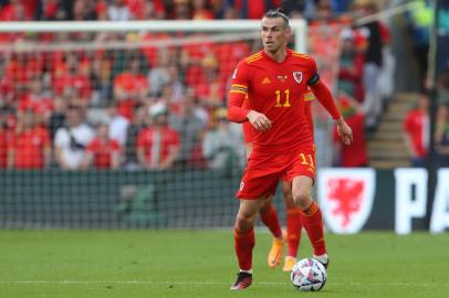 Wales midfielder Gareth Bale runs with the ball during the UEFA Nations League - League A Group 4 football match between Wales and Belgium at the Cardiff City Stadium in Cardiff on June 11, 2022. (Photo by Geoff Caddick / AFP)Editoria: SPOLocal: CardiffIndexador: GEOFF CADDICKSecao: soccerFonte: AFPFotógrafo: STR<!-- NICAID(15229475) -->