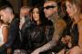 Kourtney Kardashian and her husband Travis Barker attend the Boohoo by Kourtney Kardashian show during New York Fashion Week on September 13, 2022 in New York city. (Photo by ANGELA WEISS / AFP)Editoria: ACELocal: New YorkIndexador: ANGELA WEISSSecao: fashionFonte: AFPFotógrafo: STF<!-- NICAID(15233097) -->