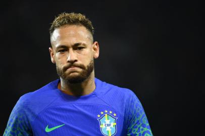 (FILES) In this file photo taken on September 27, 2022 Brazils forward Neymar reacts during the friendly football match between Brazil and Tunisia at the Parc des Princes in Paris. - With the World Cup barely a month away, Brazilian superstar Neymar goes on trial in Spain on October 17, 2022 over alleged irregularities in his transfer to Barcelona nearly a decade ago. (Photo by FRANCK FIFE / AFP)Editoria: SPOLocal: ParisIndexador: FRANCK FIFESecao: soccerFonte: AFPFotógrafo: STF<!-- NICAID(15236273) -->