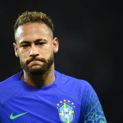 (FILES) In this file photo taken on September 27, 2022 Brazils forward Neymar reacts during the friendly football match between Brazil and Tunisia at the Parc des Princes in Paris. - With the World Cup barely a month away, Brazilian superstar Neymar goes on trial in Spain on October 17, 2022 over alleged irregularities in his transfer to Barcelona nearly a decade ago. (Photo by FRANCK FIFE / AFP)Editoria: SPOLocal: ParisIndexador: FRANCK FIFESecao: soccerFonte: AFPFotógrafo: STF<!-- NICAID(15236273) -->