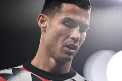 Manchester Uniteds Portuguese striker Cristiano Ronaldo reacts during the warm up prior to the English Premier League football match between Manchester United and Tottenham Hotspur at Old Trafford in Manchester, north west England, on October 19, 2022. (Photo by Oli SCARFF / AFP) / RESTRICTED TO EDITORIAL USE. No use with unauthorized audio, video, data, fixture lists, club/league logos or live services. Online in-match use limited to 120 images. An additional 40 images may be used in extra time. No video emulation. Social media in-match use limited to 120 images. An additional 40 images may be used in extra time. No use in betting publications, games or single club/league/player publications. / Editoria: SPOLocal: ManchesterIndexador: OLI SCARFFSecao: soccerFonte: AFPFotógrafo: STR<!-- NICAID(15241687) -->