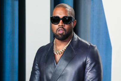 (FILES) In this file photo Kanye West attends the 2020 Vanity Fair Oscar Party following the 92nd annual Oscars at The Wallis Annenberg Center for the Performing Arts in Beverly Hills on February 9, 2020. - Entertainment mogul Kanye West on June 30, 2020 released a new song, Wash Us In the Blood, along with an accompanying video including imagery from recent anti-racism protests. The new track, the first released from the born-again rappers planned 10th album Gods Country, features lyrics with heavily biblical overtones, in line with his musical turn to Christianity in recent years. (Photo by Jean-Baptiste Lacroix / AFP)<!-- NICAID(14538337) -->