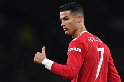 Manchester Uniteds Portuguese striker Cristiano Ronaldo gestures during the UEFA Champions league group F football match between Manchester United and Atalanta at Old Trafford stadium in Manchester, north west England, on October 20, 2021. (Photo by Paul ELLIS / AFP)Editoria: SPOLocal: ManchesterIndexador: PAUL ELLISSecao: soccerFonte: AFPFotógrafo: STF<!-- NICAID(14922627) -->