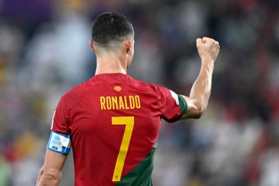 Portugals forward #07 Cristiano Ronaldo celebrates after scoring a goal during the Qatar 2022 World Cup Group H football match between Portugal and Ghana at Stadium 974 in Doha on November 24, 2022. (Photo by PATRICIA DE MELO MOREIRA / AFP)Editoria: SPOLocal: DohaIndexador: PATRICIA DE MELO MOREIRASecao: soccerFonte: AFPFotógrafo: STR<!-- NICAID(15275192) -->