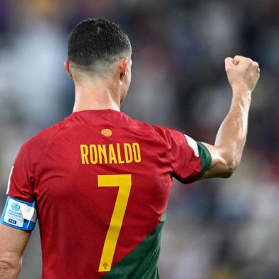 Portugals forward #07 Cristiano Ronaldo celebrates after scoring a goal during the Qatar 2022 World Cup Group H football match between Portugal and Ghana at Stadium 974 in Doha on November 24, 2022. (Photo by PATRICIA DE MELO MOREIRA / AFP)Editoria: SPOLocal: DohaIndexador: PATRICIA DE MELO MOREIRASecao: soccerFonte: AFPFotógrafo: STR<!-- NICAID(15275192) -->