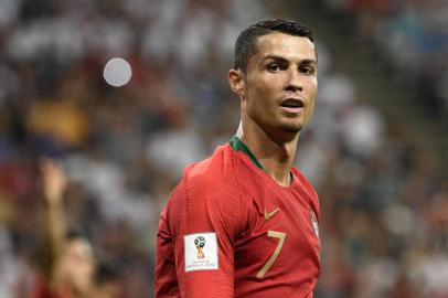 Portugals forward Cristiano Ronaldo reacts during the Russia 2018 World Cup Group B football match between Iran and Portugal at the Mordovia Arena in Saransk on June 25, 2018. (Photo by Filippo MONTEFORTE / AFP) / RESTRICTED TO EDITORIAL USE - NO MOBILE PUSH ALERTS/DOWNLOADSEditoria: SPOLocal: SaranskIndexador: FILIPPO MONTEFORTESecao: soccerFonte: AFPFotógrafo: STF<!-- NICAID(15275403) -->