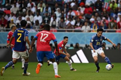 Japans forward #21 Ayase Ueda controls the ball during the Qatar 2022 World Cup Group E football match between Japan and Costa Rica at the Ahmad Bin Ali Stadium in Al-Rayyan, west of Doha on November 27, 2022. (Photo by Philip FONG / AFP)<!-- NICAID(15277744) -->