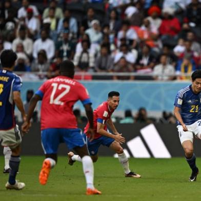 Japans forward #21 Ayase Ueda controls the ball during the Qatar 2022 World Cup Group E football match between Japan and Costa Rica at the Ahmad Bin Ali Stadium in Al-Rayyan, west of Doha on November 27, 2022. (Photo by Philip FONG / AFP)<!-- NICAID(15277744) -->